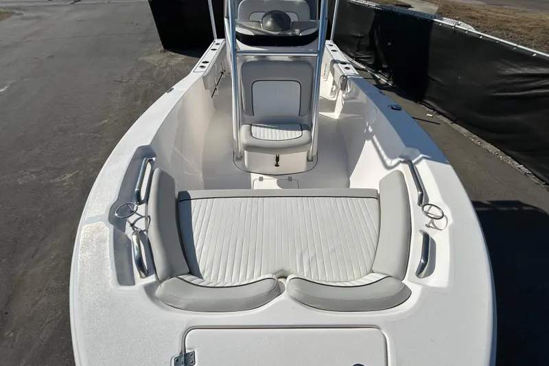 Slide: The Image of 2022 Sea Fox 206 Commander boat interior with white seating and console. - 24