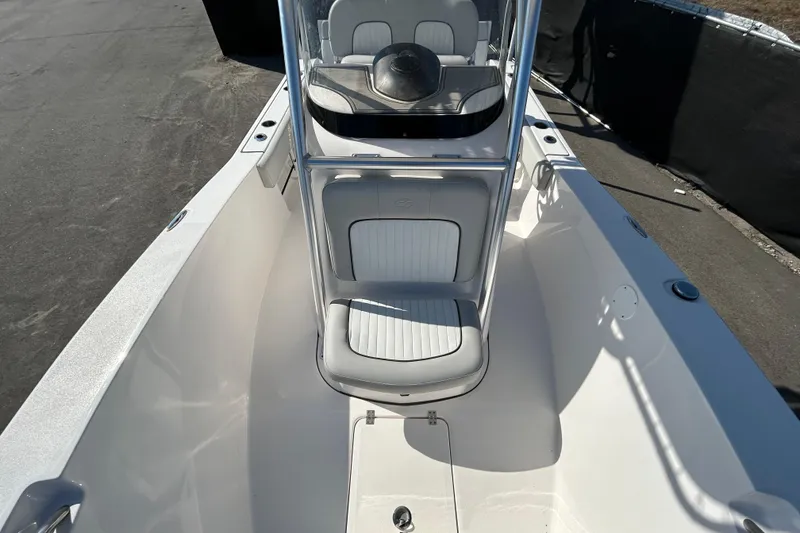 Slide: The Image of 2022 Sea Fox 206 Commander boat interior with seating and console, viewed from above. - 26
