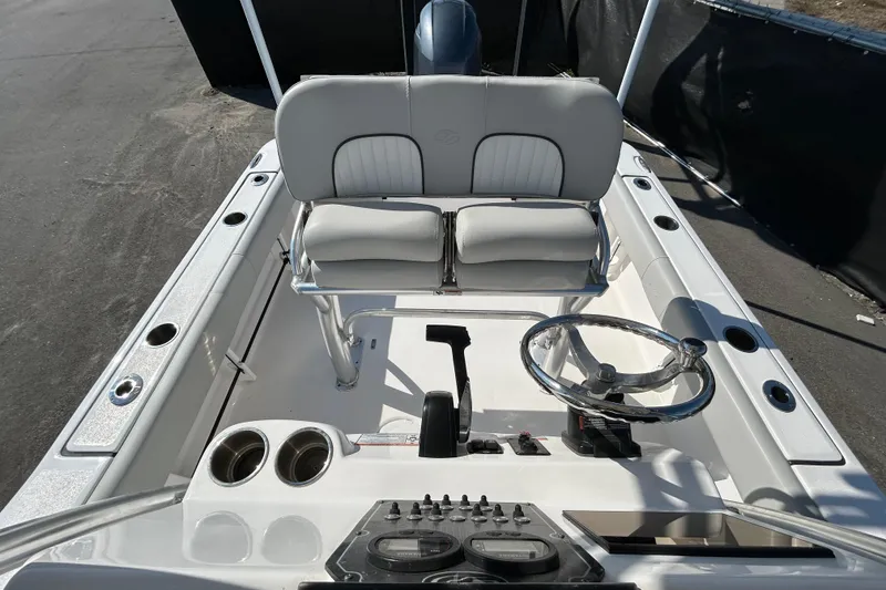 Slide: The Image of 2022 Sea Fox 206 Commander boat interior with steering wheel and seating. - 28