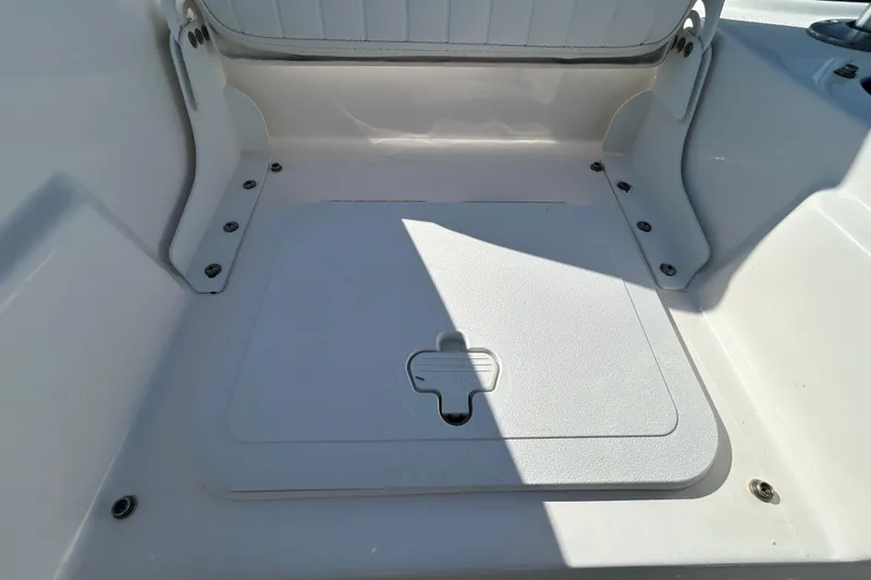 Slide: The Image of 2022 Sea Fox 206 Commander boat storage compartment with white interior. - 33