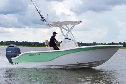 Slide: The Image of 2022 Sea Fox 206 Commander boat with 150 horsepower engine, parked outdoors. - 4