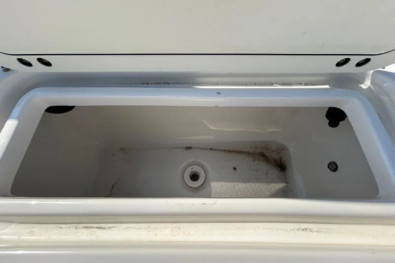 Slide: The Image of Open storage compartment on 2022 Sea Fox 206 Commander boat, showing interior details. - 40