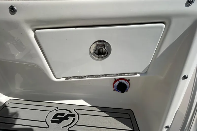 Slide: The Image of Sea Fox 206 Commander 2022 boat compartment with lock and control knob. - 50