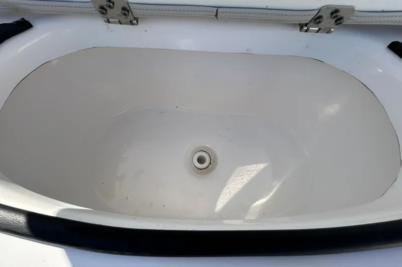 Slide: The Image of Livewell compartment in a 2022 Sea Fox 206 Commander boat. - 67