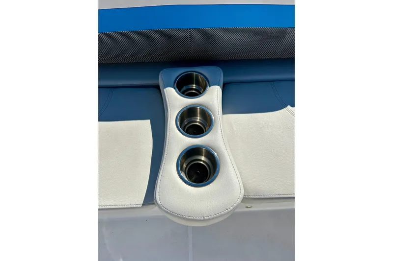 Slide: The Image of 2019 Hurricane SunDeck Sport 201 OB boat cup holders on white and blue seating. - 35