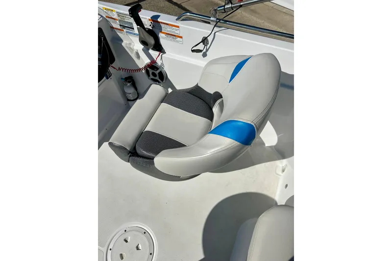 Slide: The Image of Captain's seat on 2019 Hurricane SunDeck Sport 201 OB boat, featuring modern design. - 46