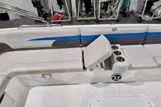 Slide: The Image of 2019 Hurricane SunDeck Sport 201 OB boat interior with seating and cup holders. - 5