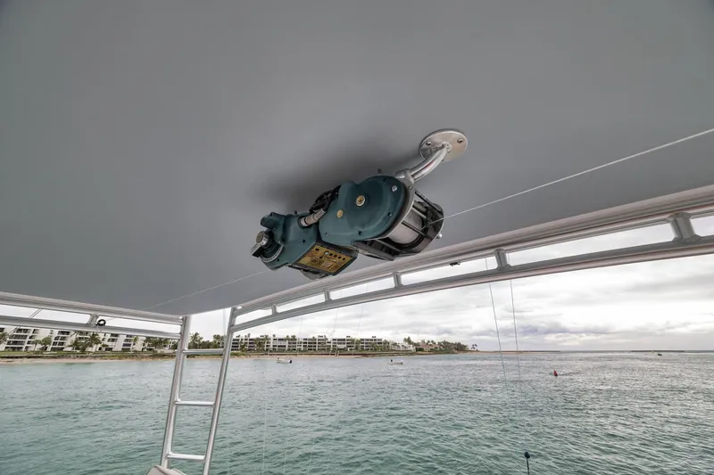 Slide: The Image of Ceiling-mounted equipment on a 1997 Merritt 58 boat, overlooking a coastal view. - 106