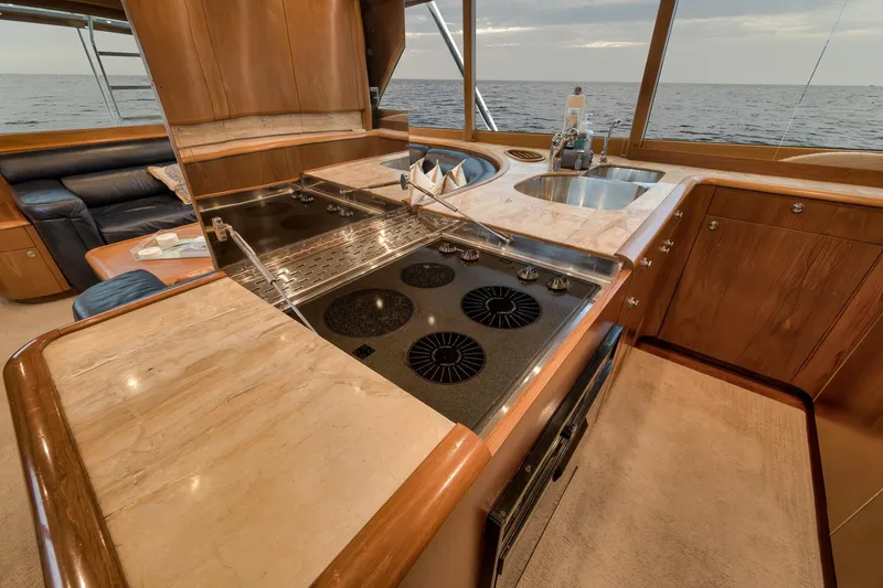 Slide: The Image of Luxurious kitchen interior of 1997 Merritt 58 yacht with ocean view. - 126
