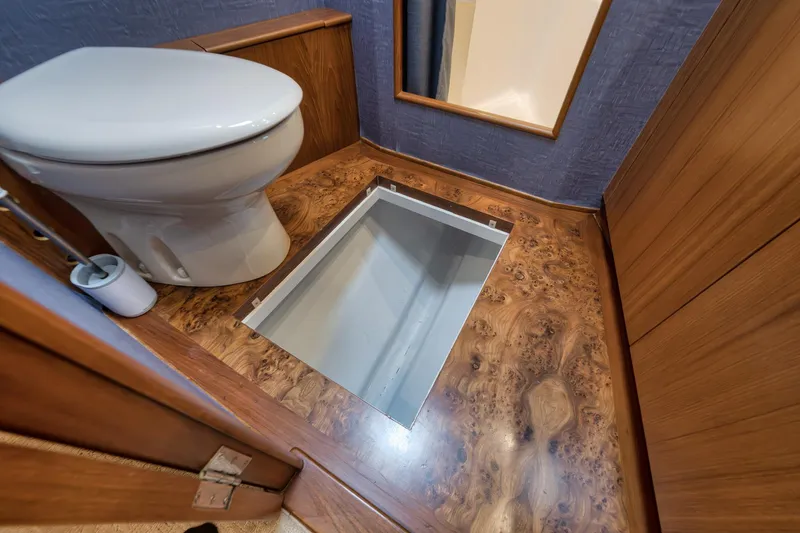 Slide: The Image of Luxury yacht Merritt 58 bathroom with wooden flooring and hidden storage, 1997 model. - 143