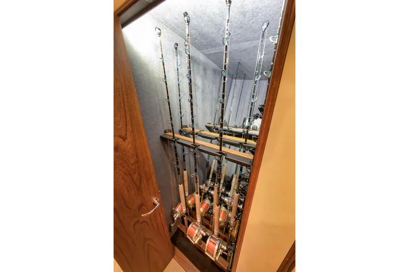 Slide: The Image of Fishing rods stored vertically in a Merritt 58 yacht, 1997 model. - 151