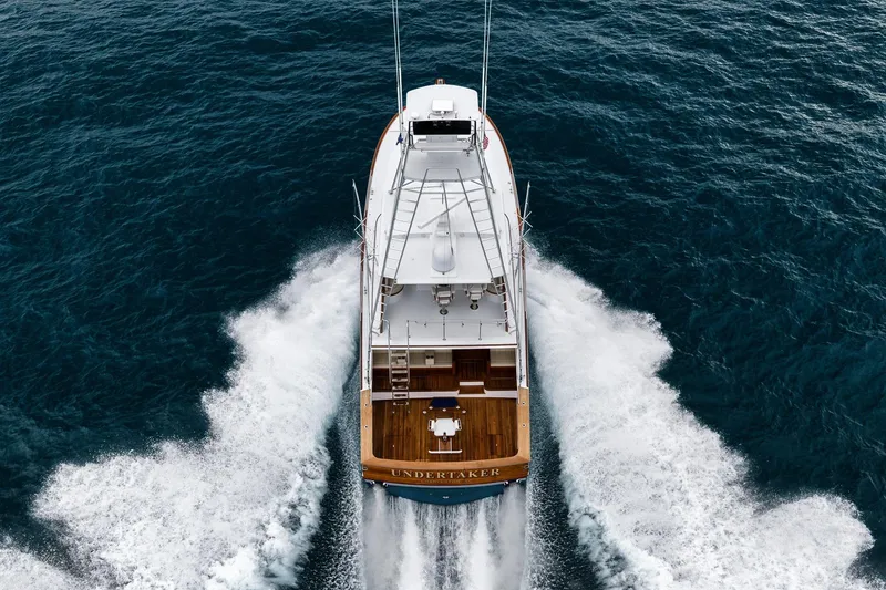 Slide: The Image of Aerial view of 1997 Merritt 58 yacht cruising through ocean waters. - 28