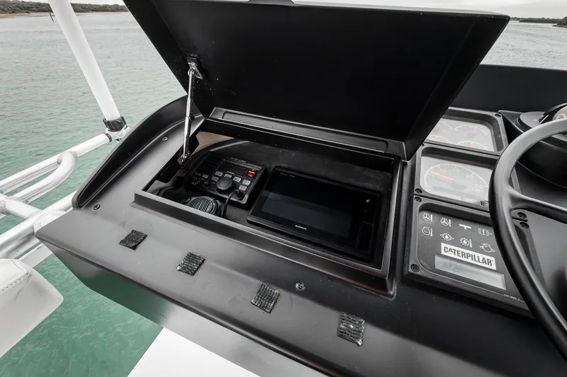 Slide: The Image of Control panel of a 1997 Merritt 58 boat with navigation equipment. - 50