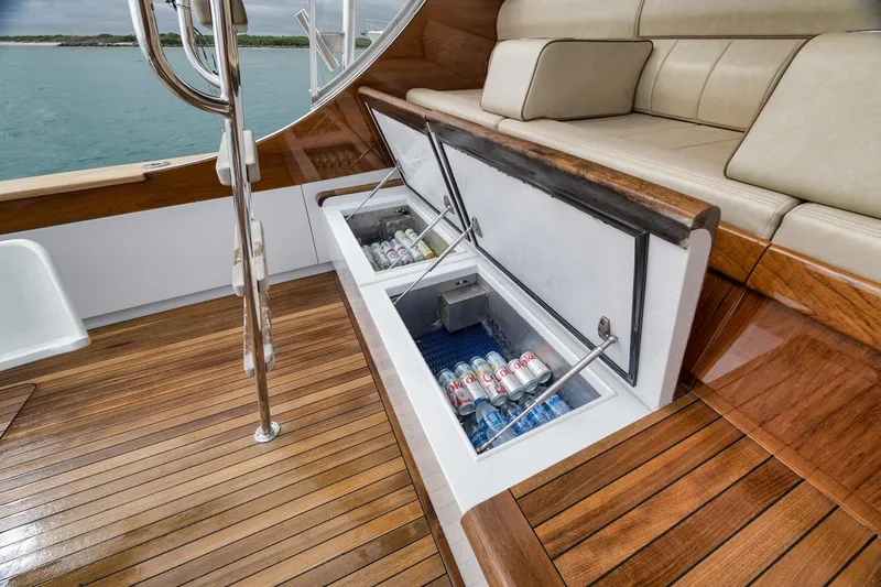 Slide: The Image of Luxurious 1997 Merritt 58 yacht with open deck storage and beverage cooler. - 70
