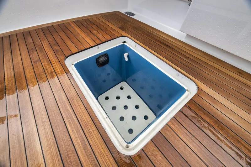 Slide: The Image of Open hatch on Merritt 58 yacht's wooden deck, 1997 model. - 82