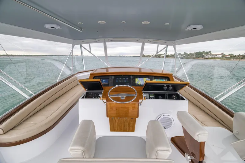 Slide: The Image of Interior view of 1997 Merritt 58 yacht helm with ocean backdrop. - 97
