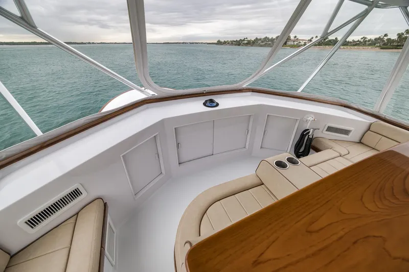 Slide: The Image of Luxurious 1997 Merritt 58 yacht interior with plush seating and ocean view. - 107