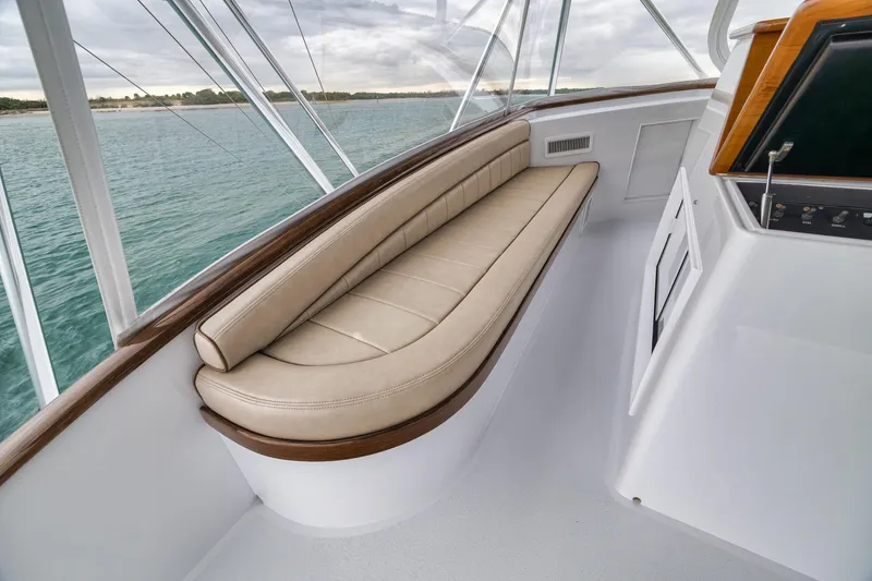 Slide: The Image of Luxurious seating area on a 1997 Merritt 58 yacht, overlooking serene waters. - 109