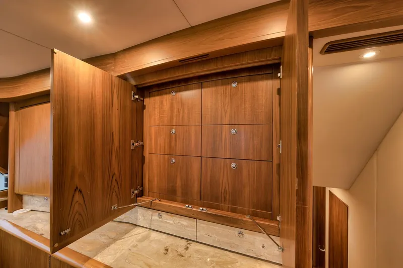 Slide: The Image of Wooden cabinetry interior on a 1997 Merritt 58 yacht, showcasing elegant design and craftsmanship. - 132