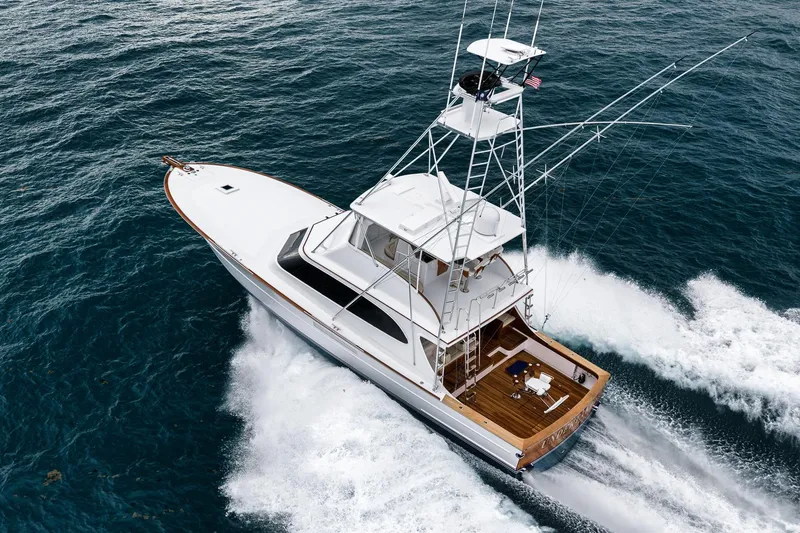 Slide: The Image of Aerial view of 1997 Merritt 58 yacht cruising on open ocean waters. - 16