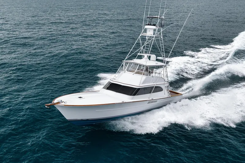 Slide: The Image of 1997 Merritt 58 yacht cruising on open ocean waters. - 3