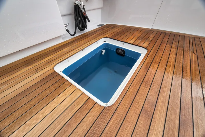 Slide: The Image of Teak deck with open hatch on 1997 Merritt 58 yacht. - 84
