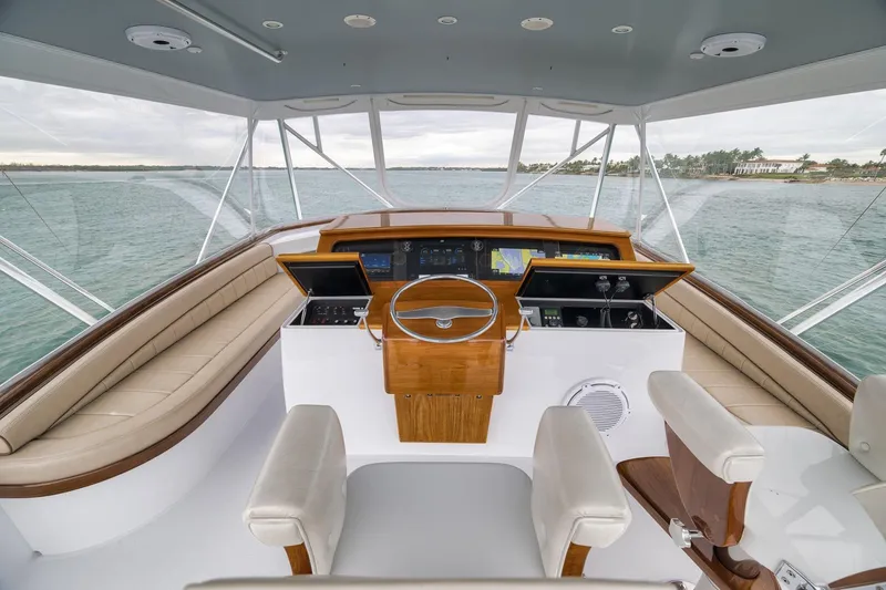 Slide: The Image of Helm of 1997 Merritt 58 yacht with panoramic ocean view. - 98