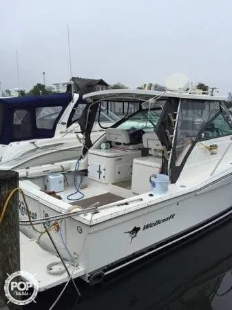 Slide: The Image of Wellcraft 330 Coastal 2004 - 2