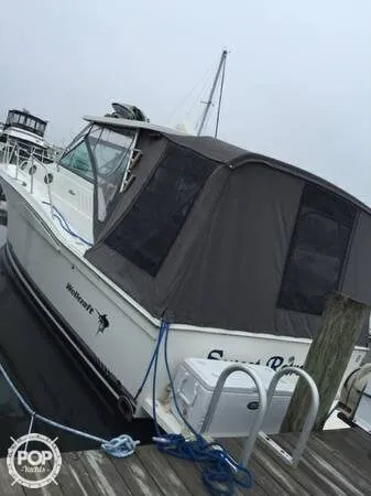 Slide: The Image of Wellcraft 330 Coastal 2004 - 4