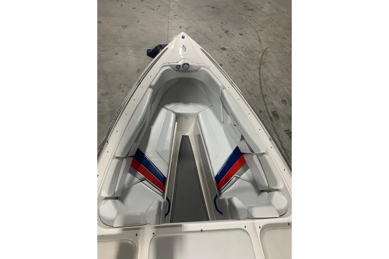 Slide: The Image of 2008 Sunsation 32 Mid-Cabin boat interior with white seating and red-blue accents. - 14