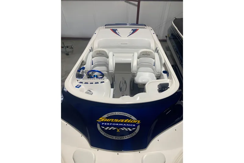 Slide: The Image of 2008 Sunsation 32 Mid-Cabin boat with sleek design and comfortable seating. - 3