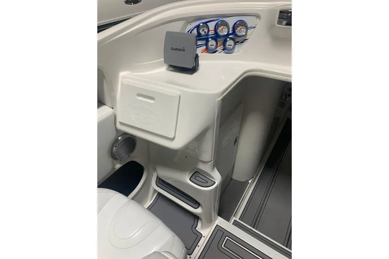 Slide: The Image of 2008 Sunsation 32 Mid-Cabin boat interior with Garmin device and control panel. - 7