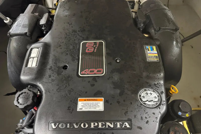 Slide: The Image of Volvo Penta 8.1 Gi engine in a 2012 Cobalt 276 boat, close-up view. - 12