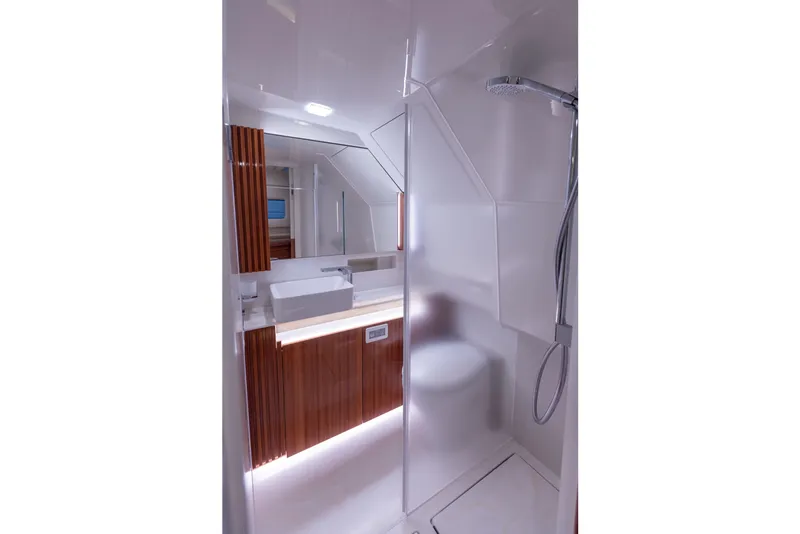 Slide: The Image of Luxurious bathroom in 2024 Wiszniewski Yachts W43, featuring modern shower and sleek design. - 10
