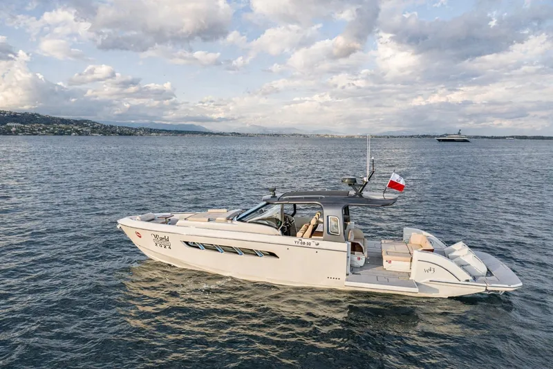 Slide: The Image of 2024 Wiszniewski Yachts W43 cruising on open water under a cloudy sky. - 5