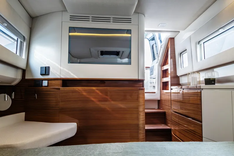 Slide: The Image of Luxurious interior of 2026 Wiszniewski Yachts W43, featuring elegant wood finishes and modern design. - 10