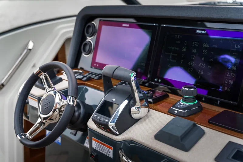 Slide: The Image of Cockpit of 2026 Wiszniewski Yachts W43, featuring advanced navigation and control systems. - 8