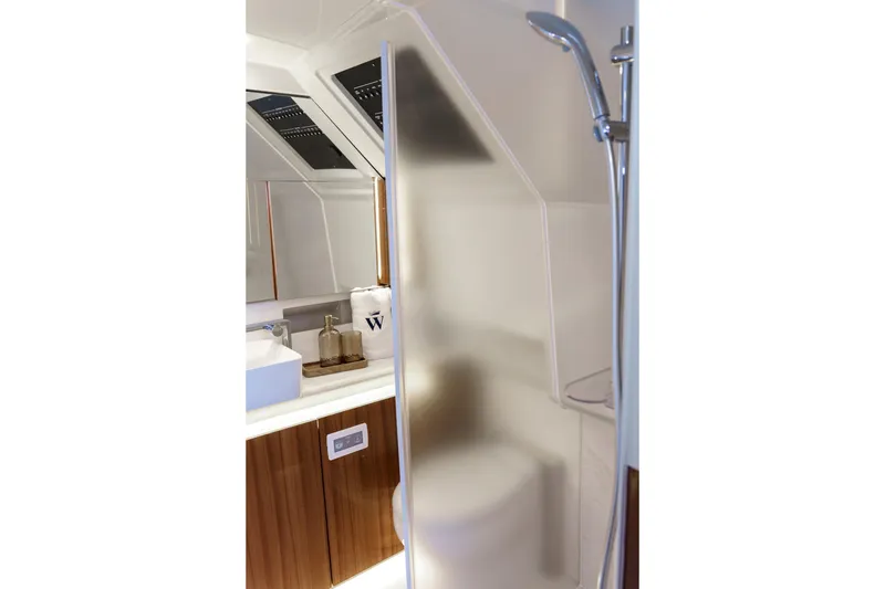 Slide: The Image of Luxurious bathroom in 2026 Wiszniewski Yachts W43, featuring modern fixtures and elegant design. - 11