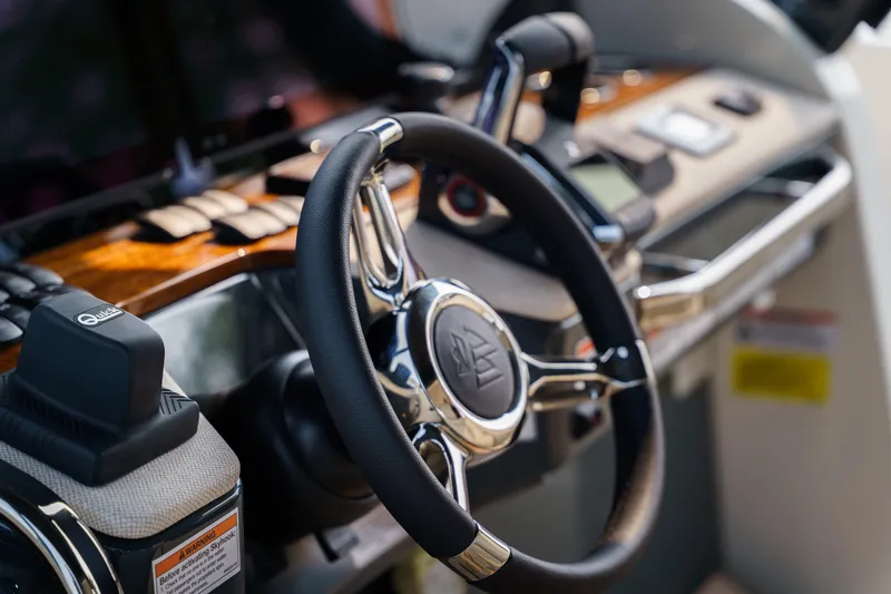 Slide: The Image of Steering wheel and controls of 2026 Wiszniewski Yachts W43, featuring sleek design and advanced technology. - 6