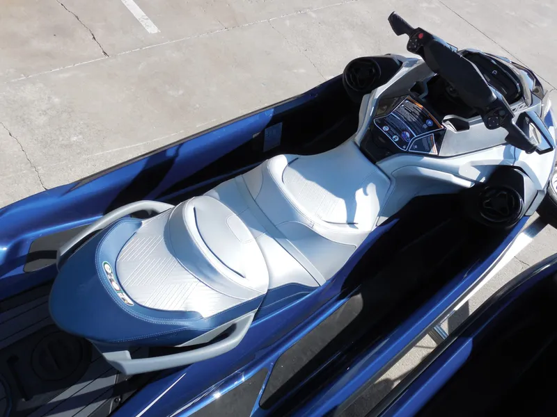 Slide: The Image of 2024 Sea-Doo GTX Limited 300 jet ski, blue and white seating. - 12