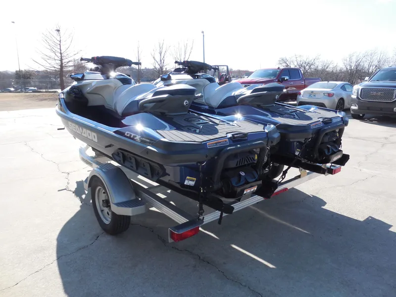 Slide: The Image of 2024 Sea-Doo GTX Limited 300 jet skis on trailer. - 6