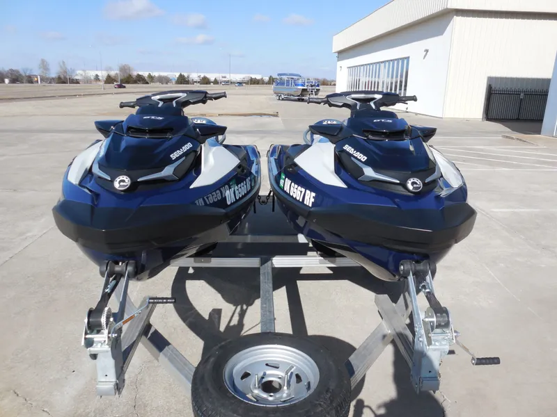 Slide: The Image of Two 2024 Sea-Doo GTX Limited 300 jet skis on trailer. - 9