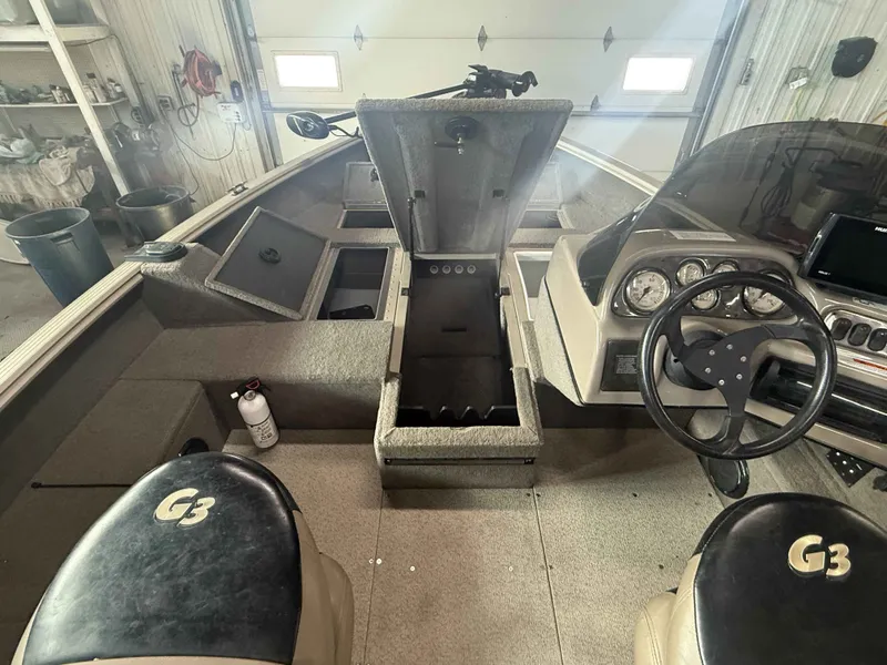 Slide: The Image of Interior of a 2011 G3 V172 FS boat with steering console. - 11