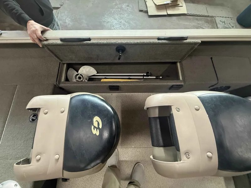 Slide: The Image of Interior of a G3 V172 FS boat with storage compartment and seats. - 2