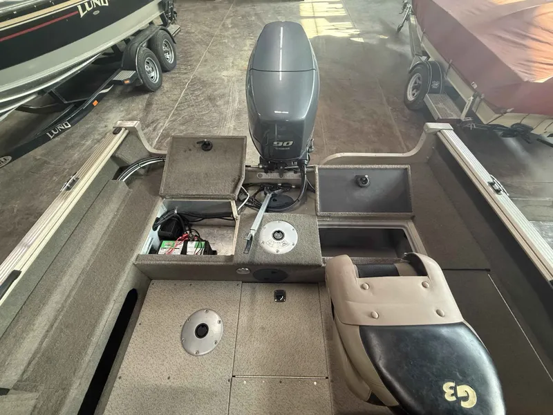 Slide: The Image of Interior view of a 2011 G3 V172 FS boat with motor. - 3