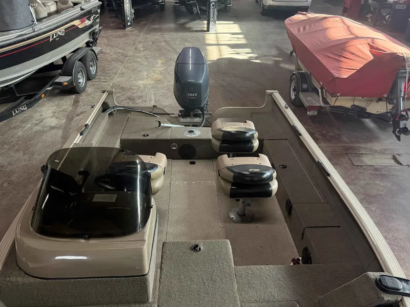 Slide: The Image of 2011 G3 V172 FS boat interior with motor view. - 7