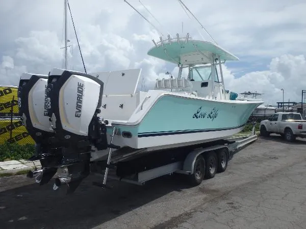 Slide: The Image of Regulator Marine 32 FS 2015 Evinrude G2's 2006 - 1