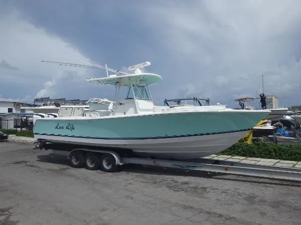 Slide: The Image of Regulator Marine 32 FS 2015 Evinrude G2's 2006 - 2