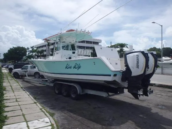 Slide: The Image of Regulator Marine 32 FS 2015 Evinrude G2's 2006 - 6