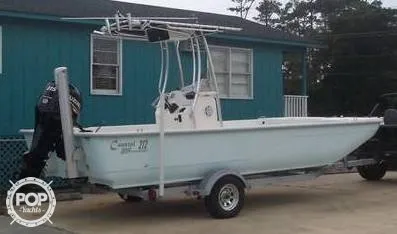 Slide: The Image of Four Son's 212 Coastal Skiff 2012 - 1